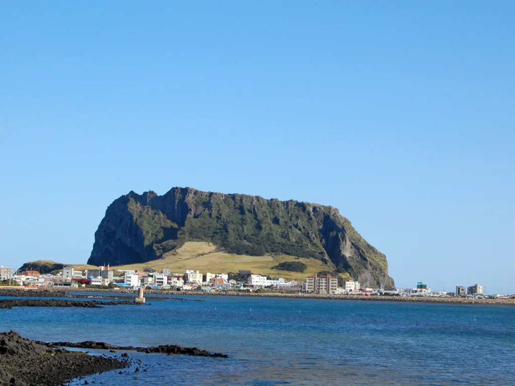 Seongsan Ilchulbong, the tuff cone rising from the sea on the east coast of Jeju.