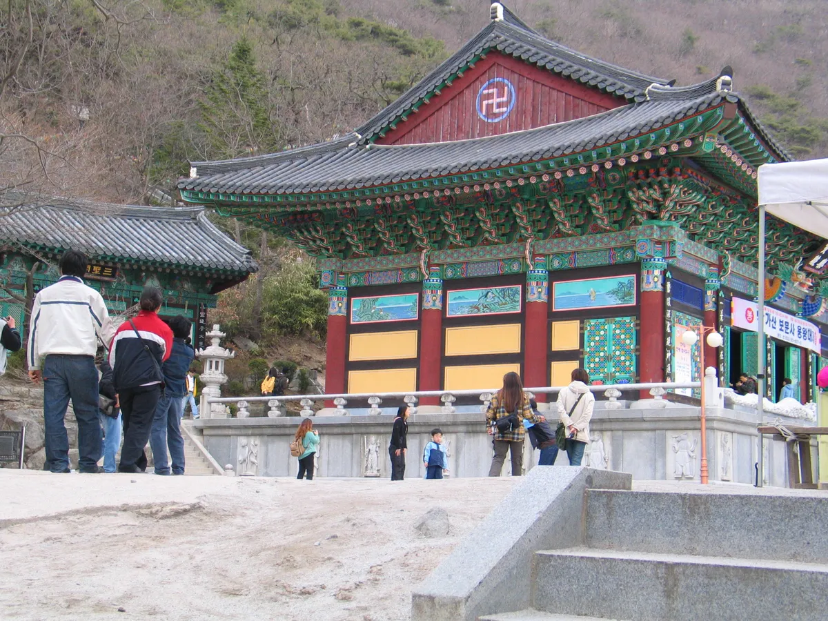Bomunsa on the slope of Nakgasan, Seokmodo, its halls set against the wooded hillside.