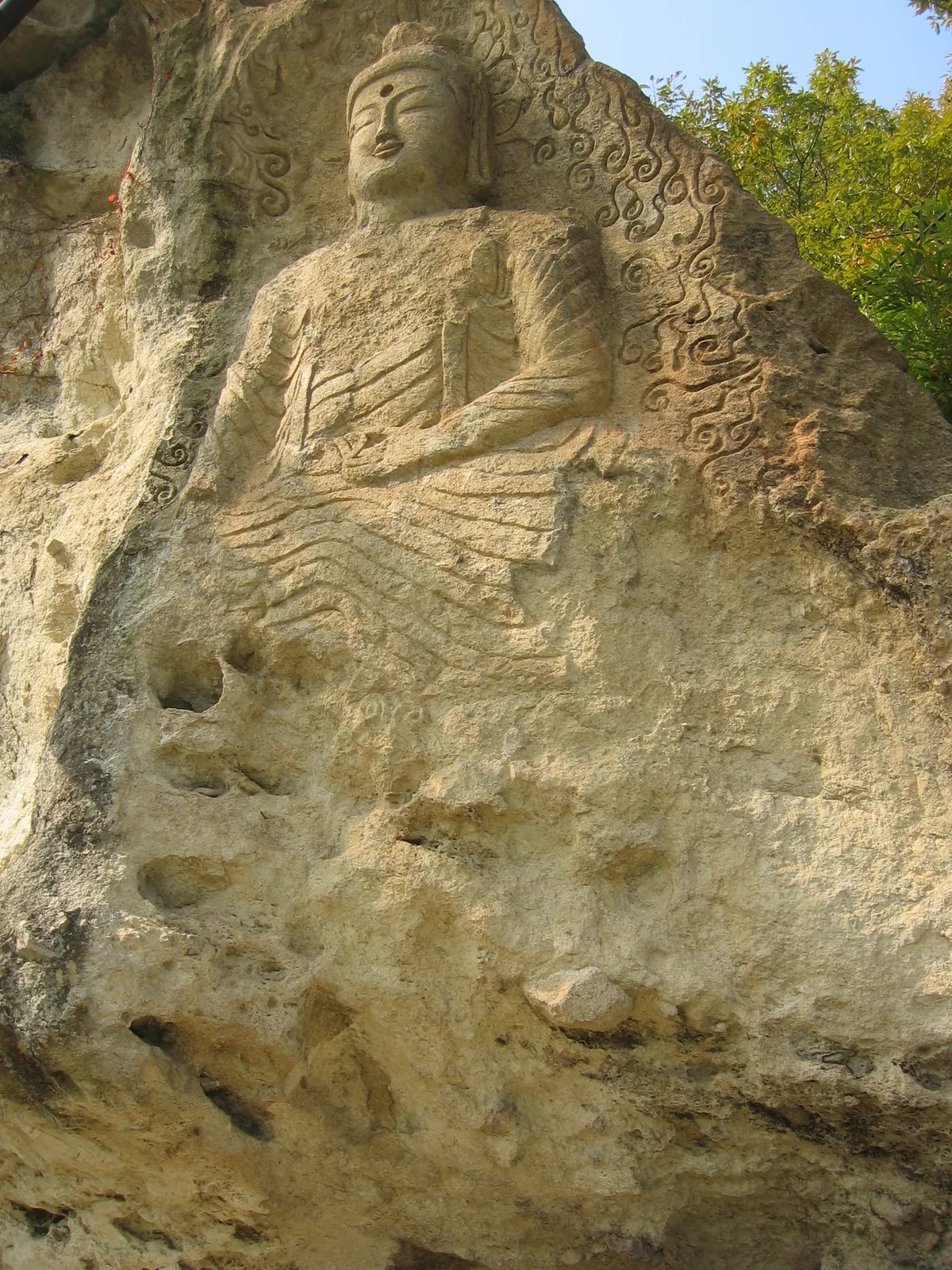 The rock face and cave openings of Golgulsa in Gyeongju.