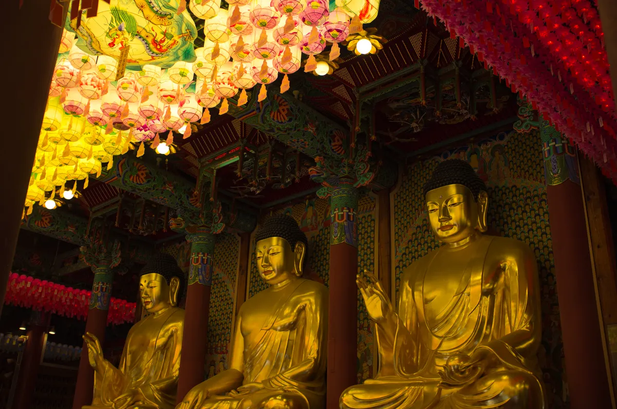 The main hall of Jogyesa, its bracketed eaves rising above the temple courtyard in central Seoul.