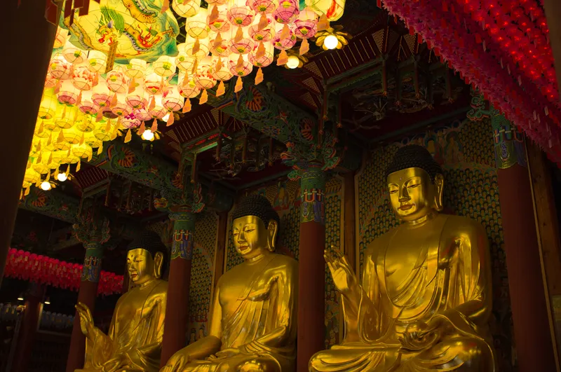 The main hall of Jogyesa, its bracketed eaves rising above the temple courtyard in central Seoul.
