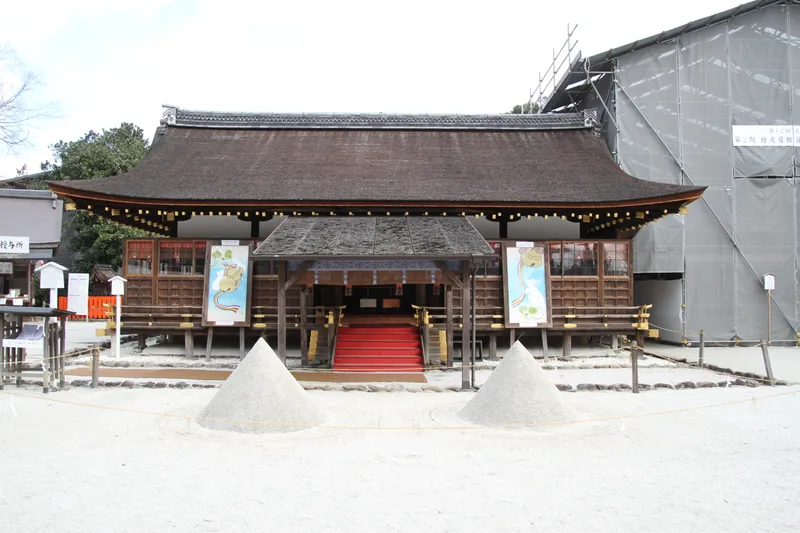 The worship hall at Kamigamo Jinja with the pair of conical sand mounds before it.