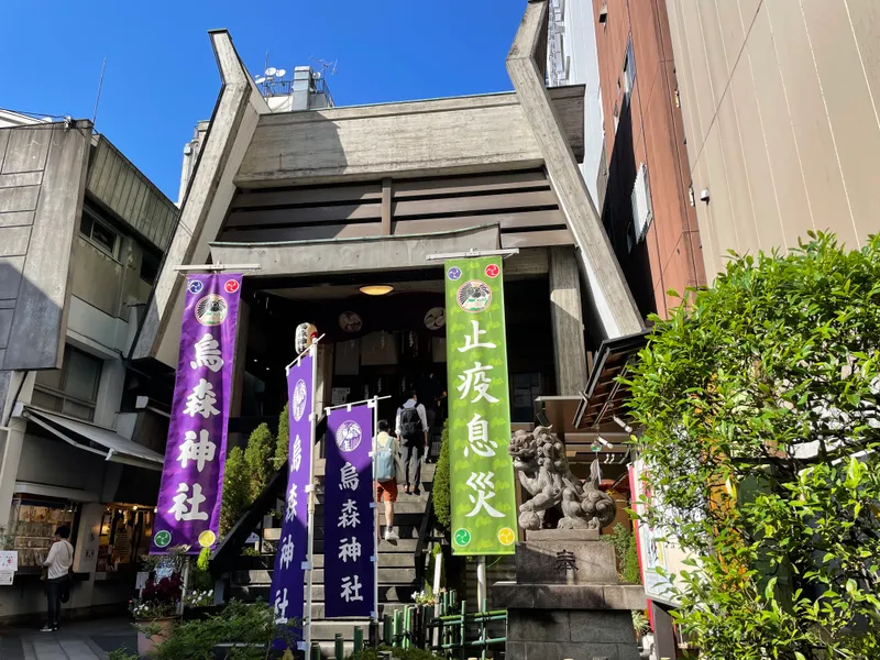 Karasumori Shrine at the end of a narrow alley in Shimbashi