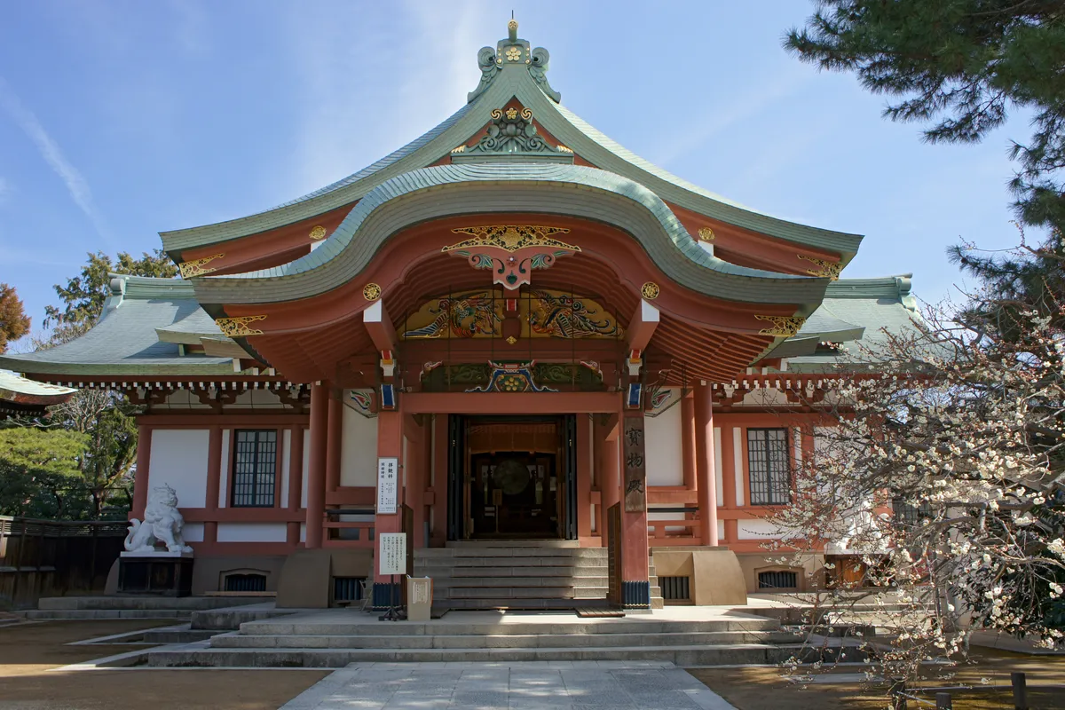 The gilded and carved front of the main hall at Kitano Tenmangu.