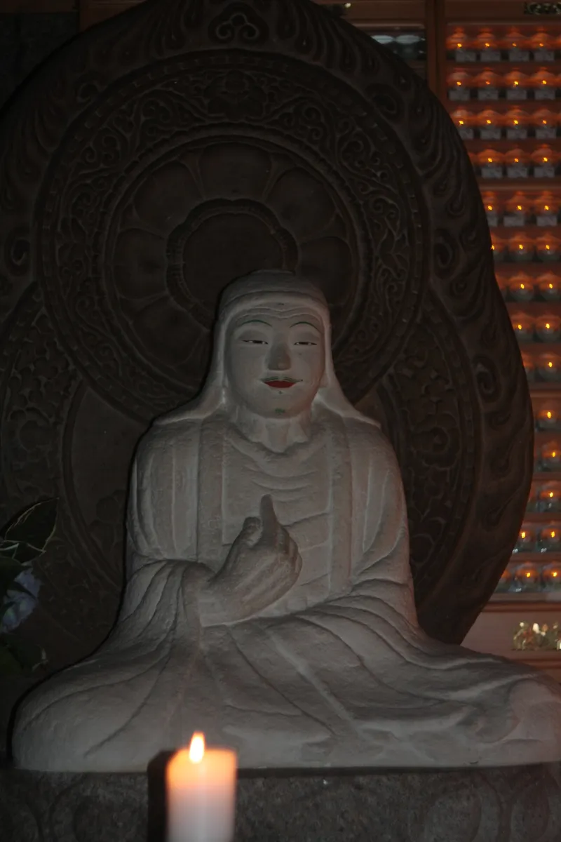 The seated stone image of the master Seungga at Seunggasa on Bukhansan, Seoul.
