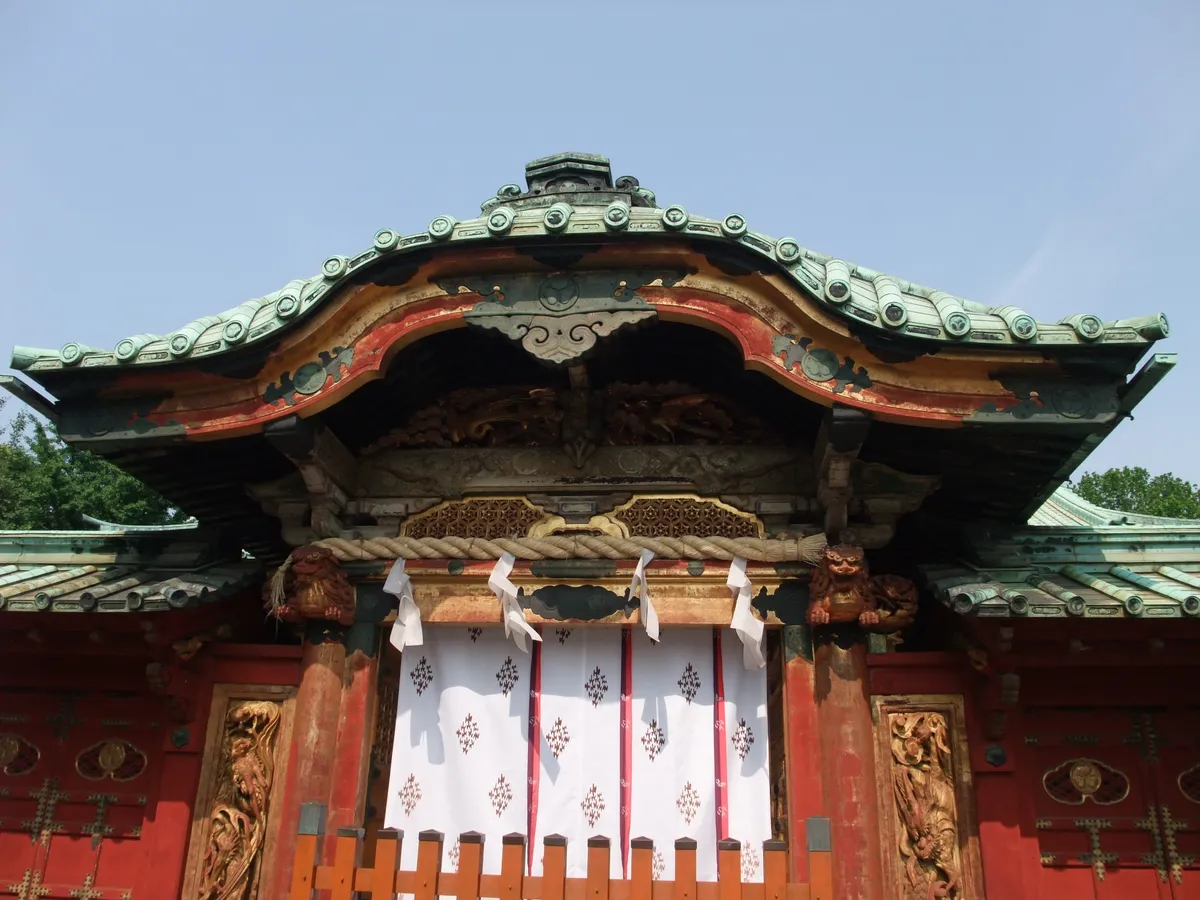 The Chinese-style gate of Ueno Toshogu, gilded and carved, seen from the approach