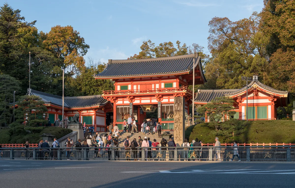 The vermilion west gate of Yasaka Shrine at the end of Shijo street.