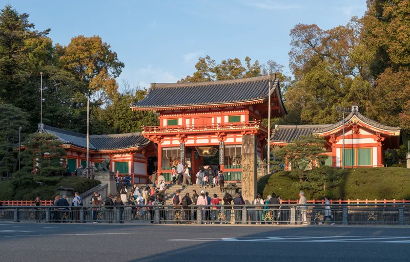The vermilion west gate of Yasaka Shrine at the end of Shijo street.