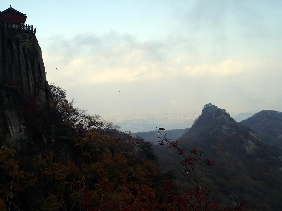 Yeonjudae perched on the rock at the summit of Gwanaksan, the hall built out to the edge of the cliff.